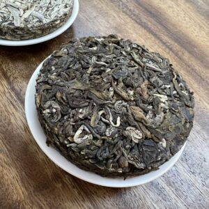 Thiên Khôi – Trà Shan Tuyết cổ thụ đóng bánh – Tiên Thiên Trà