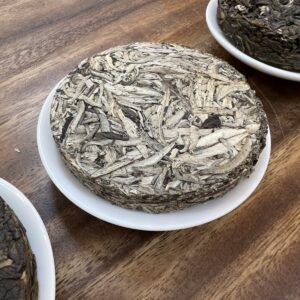 Thiên Khôi – Trà Shan Tuyết cổ thụ đóng bánh – Tiên Thiên Trà